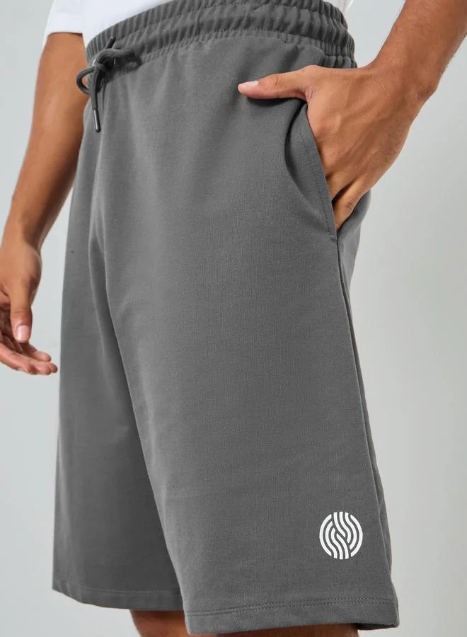 Styli  Men White Oversized Polo and Shorts Co-Ords for Men | Best Price UAE